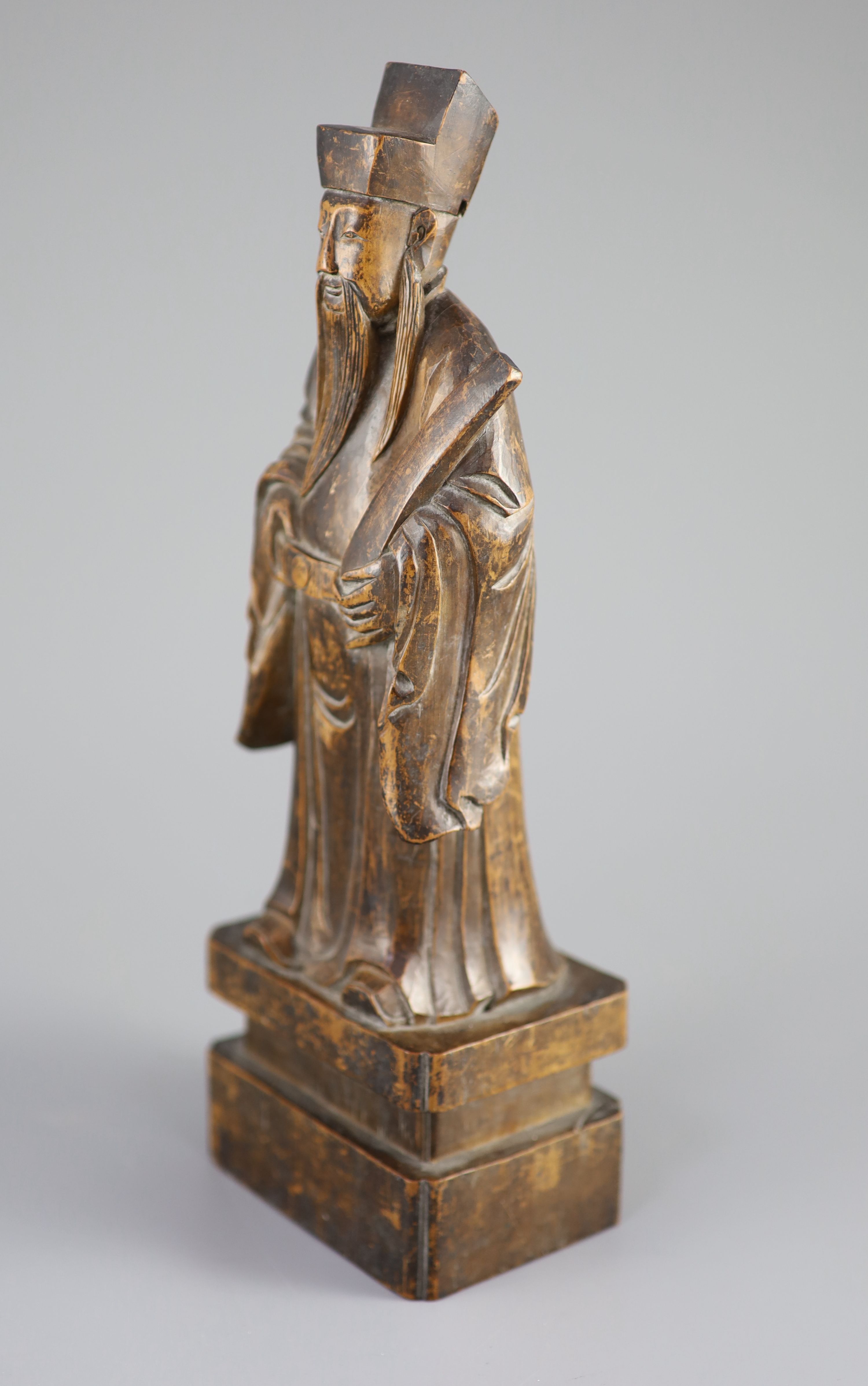 A Chinese boxwood figure of an immortal, 19th century, 29.5 cm high